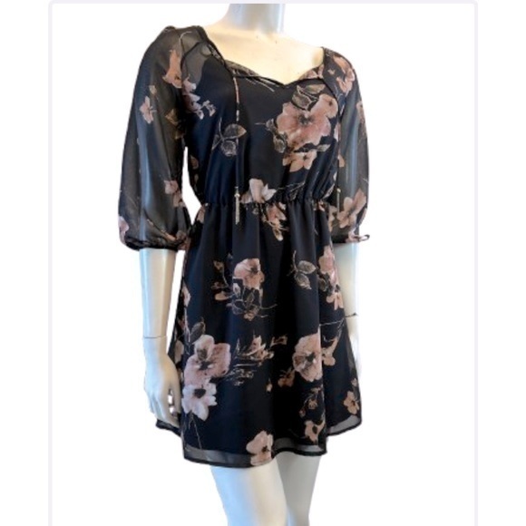 Dynamite Dresses & Skirts - Pretty floral dress. Sheer with tank liner. Tassel details. Elastic waistband.